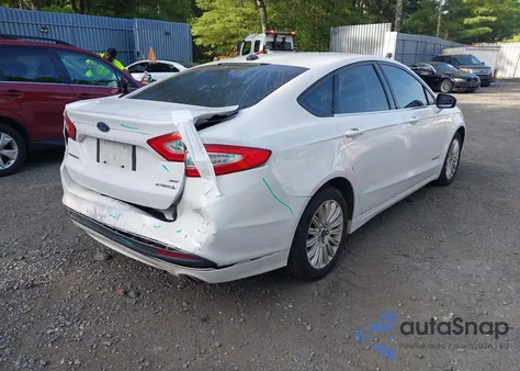 2013 Ford Fusion Hybrid Se z USA, uszkodzony, nr VIN 3FA6P0LUXDR349019